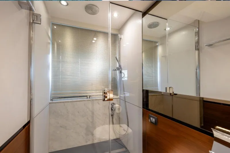  Yacht Photos Pics Luxurious bathroom interior on 2017 Princess S65 yacht, featuring modern shower and elegant design.