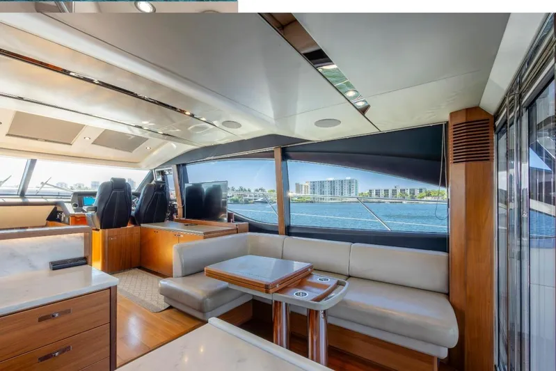  Yacht Photos Pics Luxurious interior of 2017 Princess S65 yacht with modern seating and scenic ocean view.