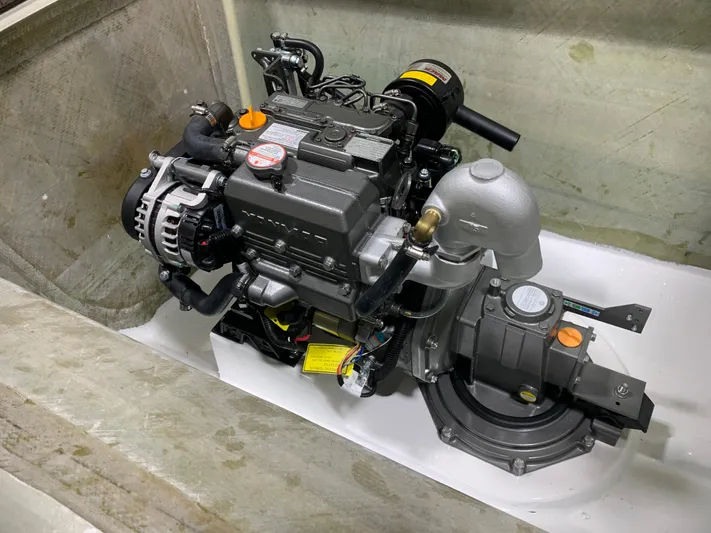  Yacht Photos Pics 2024 Schionning Arrow 1280 S engine compartment with visible engine components.