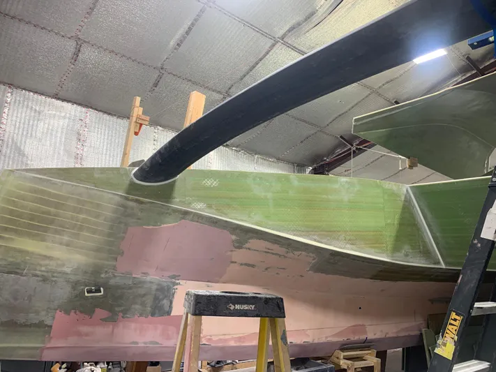  Yacht Photos Pics 2024 Schionning Arrow 1280 S catamaran under construction in a workshop.