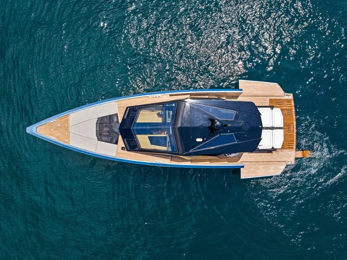 Yacht Photos Pics Aerial view of 2023 Wally WALLYPOWER58 yacht on blue ocean water.