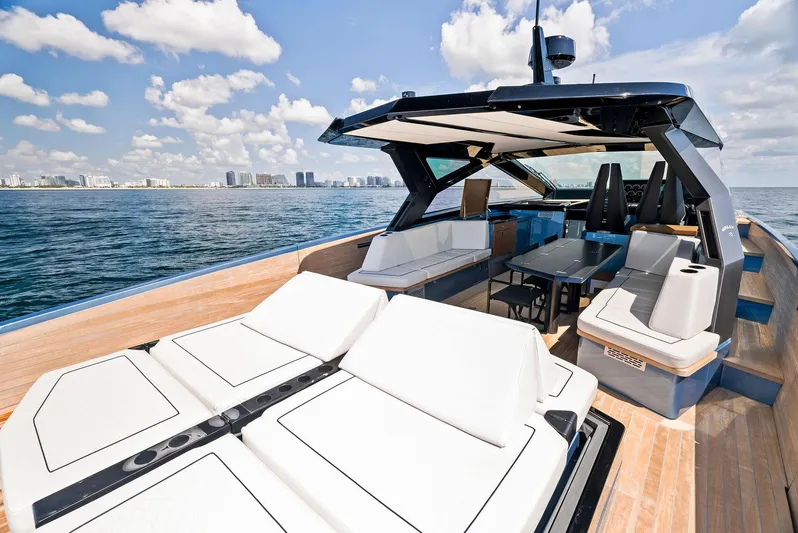  Yacht Photos Pics Luxurious 2023 Wally WALLYPOWER58 yacht with spacious deck and modern design on open water.