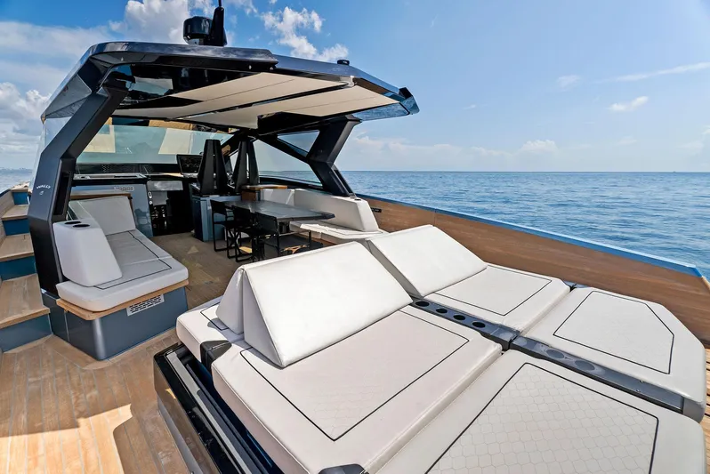  Yacht Photos Pics Luxurious 2023 Wally WALLYPOWER58 yacht interior with sun loungers and ocean view.