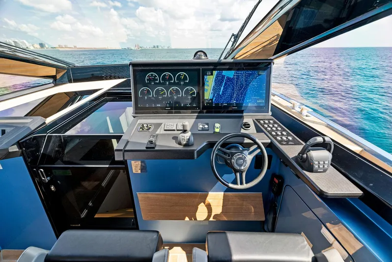  Yacht Photos Pics 2023 Wally WALLYPOWER58 yacht cockpit with advanced navigation system and ocean view.