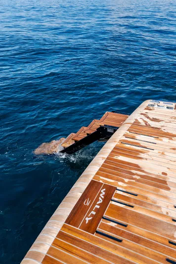  Yacht Photos Pics Luxury 2023 Wally WALLYPOWER58 yacht with wooden deck and sea view.