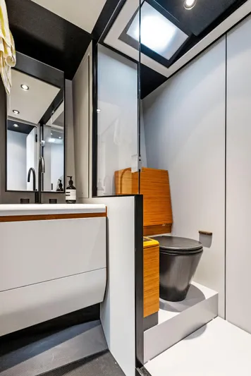 Yacht Photos Pics Modern bathroom in 2023 Wally WALLYPOWER58 yacht with sleek design and skylight.
