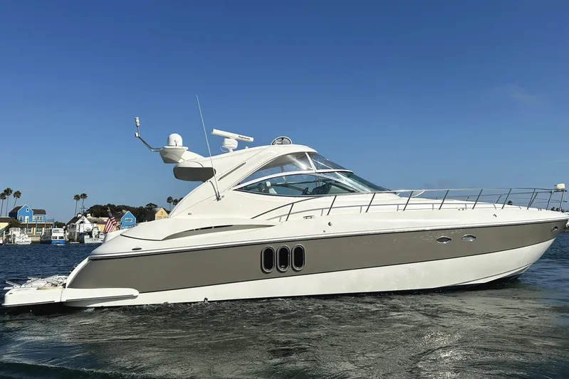  Yacht Photos Pics 2007 Cruisers Yachts 540 Express on water, clear sky background.