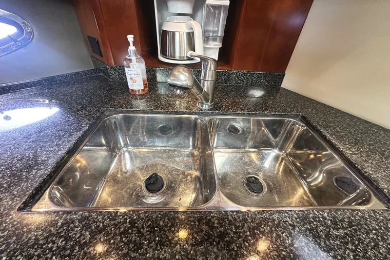  Yacht Photos Pics Stainless steel double sink in 2007 Cruisers Yachts 540 Express kitchen.