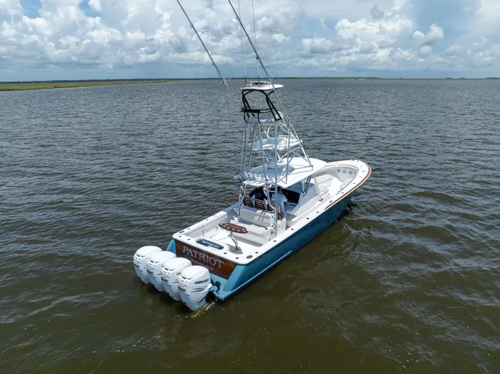 Patriot Yacht Photos Pics 2022 Valhalla Boatworks V41 on open water, featuring four powerful outboard engines.