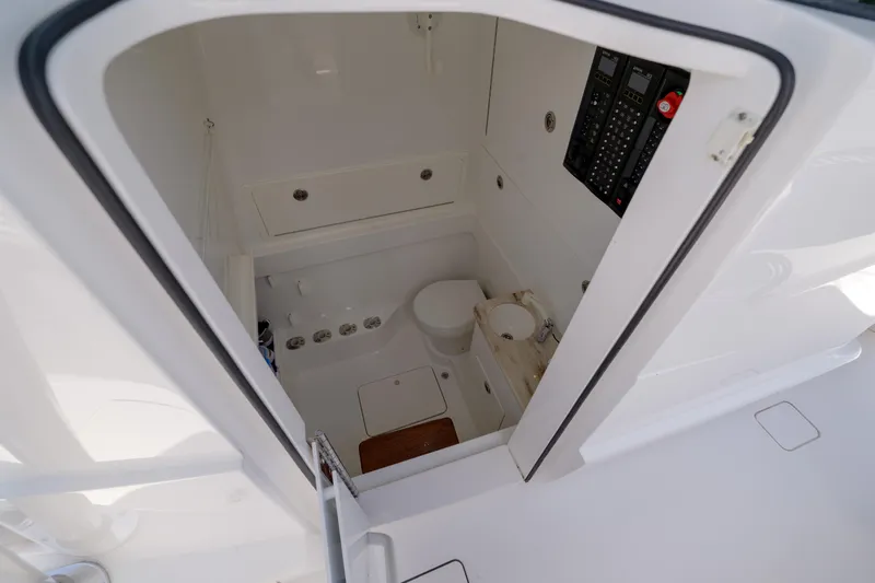 Patriot Yacht Photos Pics 2022 Valhalla Boatworks V41 interior cabin with toilet and control panel.