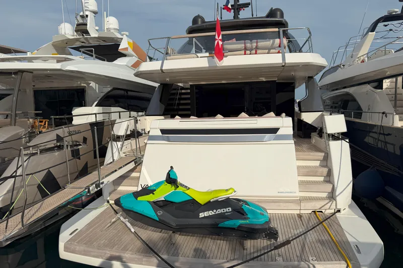 T-b Yacht Photos Pics 2022 Sanlorenzo SL96A yacht with Sea-Doo jet ski on deck, docked at marina.