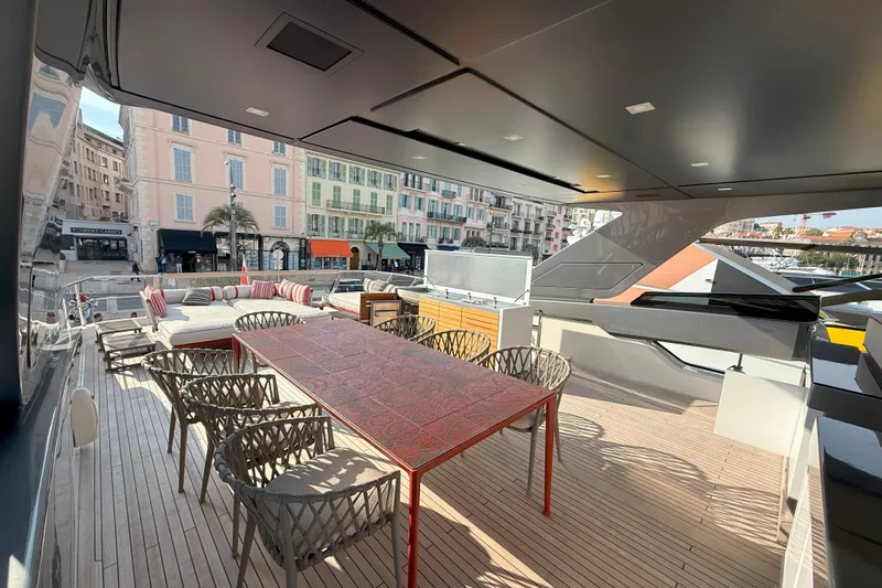 T-b Yacht Photos Pics Luxurious 2022 Sanlorenzo SL96A yacht deck with elegant seating and dining area.