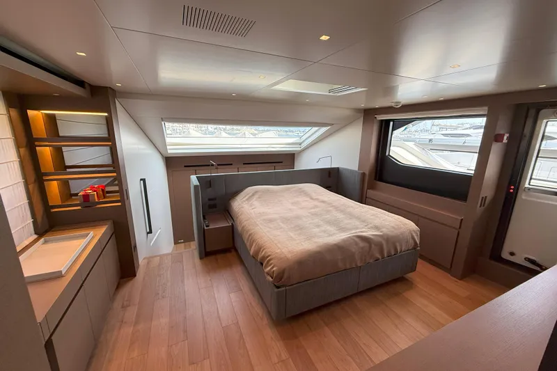 T-b Yacht Photos Pics Luxurious 2022 Sanlorenzo SL96A yacht bedroom with modern design and large windows.