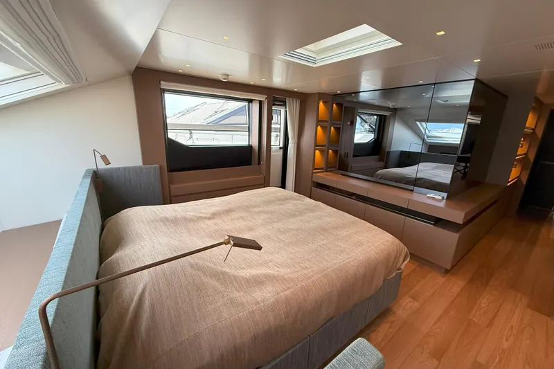 T-b Yacht Photos Pics Luxurious bedroom interior of 2022 Sanlorenzo SL96A yacht with modern design and skylight.