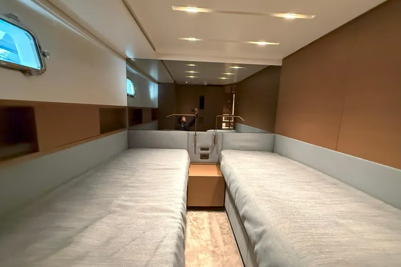 T-b Yacht Photos Pics Luxurious twin cabin interior of 2022 Sanlorenzo SL96A yacht, featuring modern design and ambient lighting.