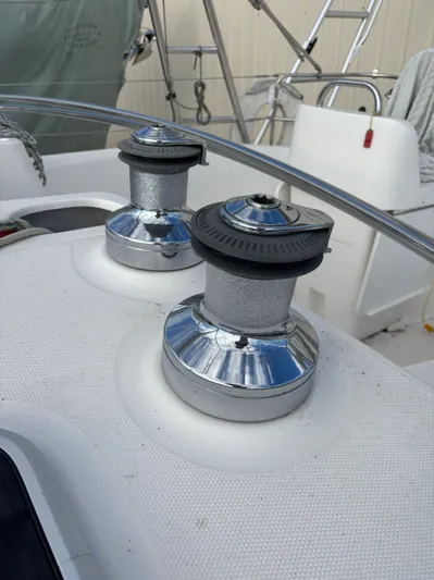 Royal Dawn Yacht Photos Pics Two winches on a 2001 Hunter 460 sailboat deck, with stainless steel finish.