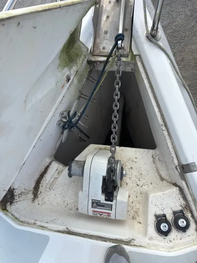 Royal Dawn Yacht Photos Pics Anchor chain and windlass on a 2001 Hunter 460 sailboat deck.