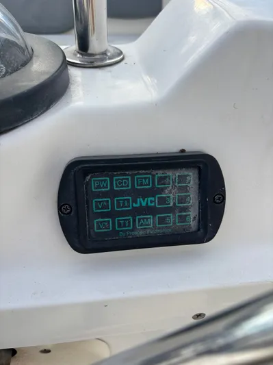 Royal Dawn Yacht Photos Pics JVC control panel on a 2001 Hunter 460 boat dashboard.