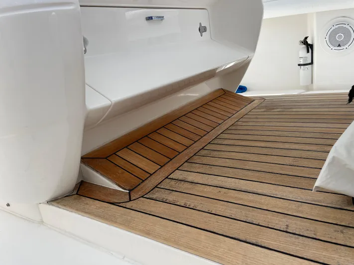  Yacht Photos Pics 2013 Intrepid 375 Center Console with teak deck and white seating.