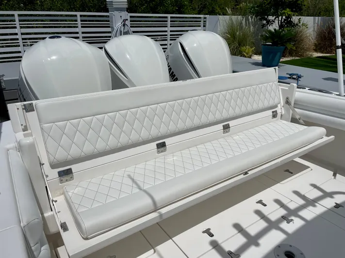  Yacht Photos Pics Intrepid 375 Center Console 2013 with white quilted seating and triple outboard engines.