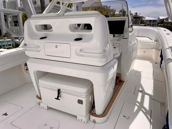  Yacht Photos Pics 2013 Intrepid 375 Center Console boat interior with helm and seating area.