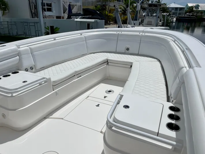  Yacht Photos Pics 2013 Intrepid 375 Center Console boat with spacious white seating area.