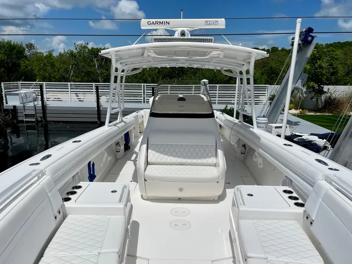  Yacht Photos Pics 2013 Intrepid 375 Center Console boat with white seating and Garmin equipment.