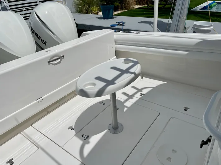  Yacht Photos Pics 2013 Intrepid 375 Center Console boat deck with Yamaha engines and fishing rod holder.