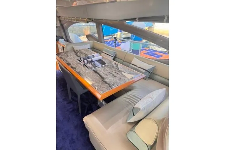  Yacht Photos Pics Luxurious interior of 2014 Azimut 70 yacht with elegant seating and marble table.