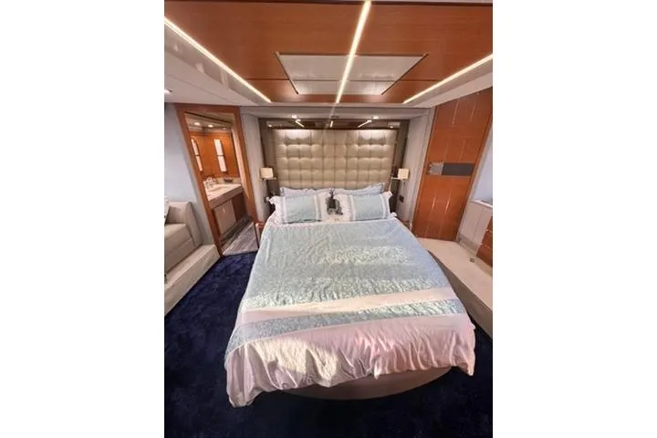  Yacht Photos Pics Luxurious bedroom interior of 2014 Azimut 70 yacht with elegant bedding and modern design.