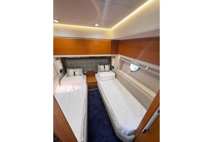  Yacht Photos Pics Luxurious cabin interior of 2014 Azimut 70 yacht with twin beds and modern design.