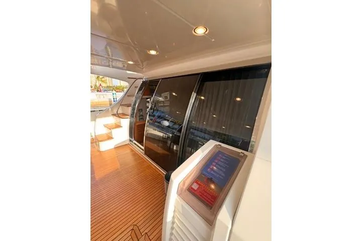  Yacht Photos Pics Luxurious 2014 Azimut 70 yacht deck with wooden flooring and modern design.