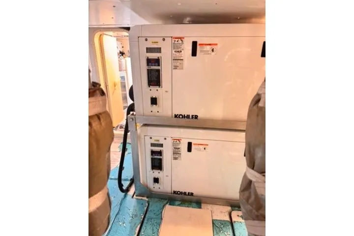  Yacht Photos Pics Engine room of 2014 Azimut 70 yacht featuring Kohler generators.