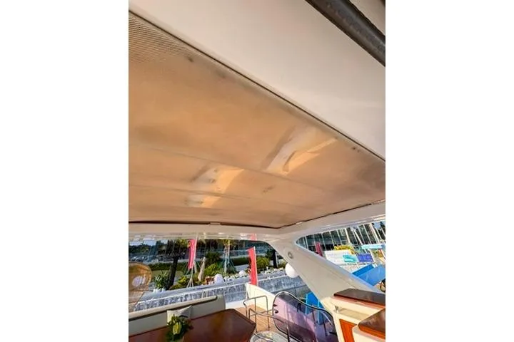  Yacht Photos Pics 2014 Azimut 70 yacht interior ceiling view with marina backdrop.