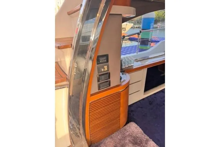  Yacht Photos Pics Interior view of 2014 Azimut 70 yacht, featuring modern design and wood accents.