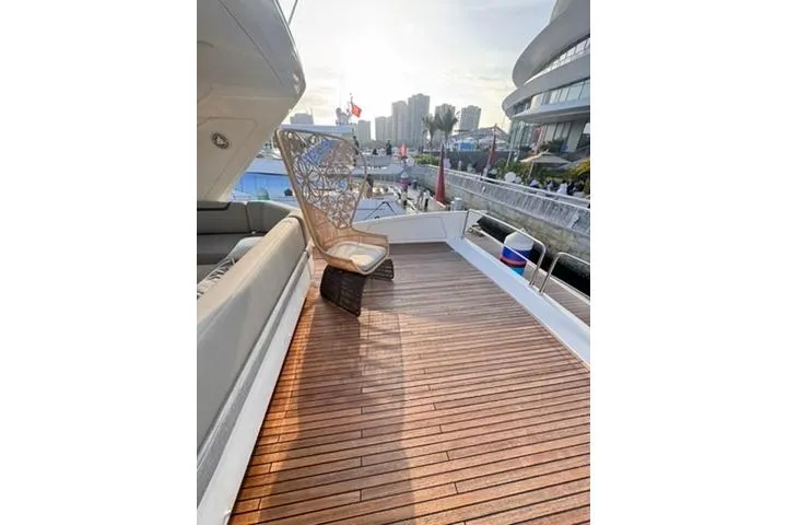  Yacht Photos Pics Luxurious deck of 2014 Azimut 70 yacht with elegant seating and cityscape view.