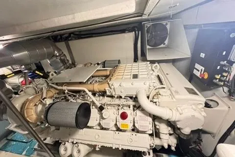  Yacht Photos Pics Engine room of a 2014 Azimut 70 yacht, showcasing a powerful marine engine.