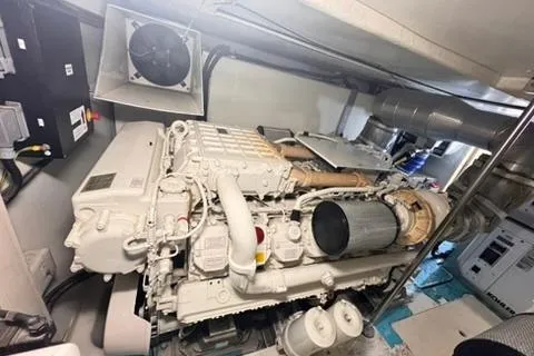  Yacht Photos Pics Engine room of a 2014 Azimut 70 yacht, showcasing a powerful marine engine.