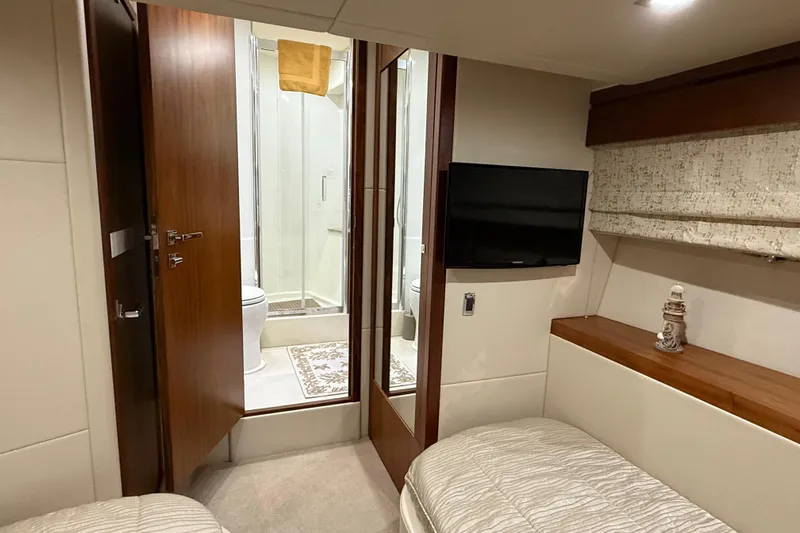 Thomas Yacht Photos Pics Luxurious interior of 2012 Sunseeker Manhattan 63 yacht with ensuite bathroom.