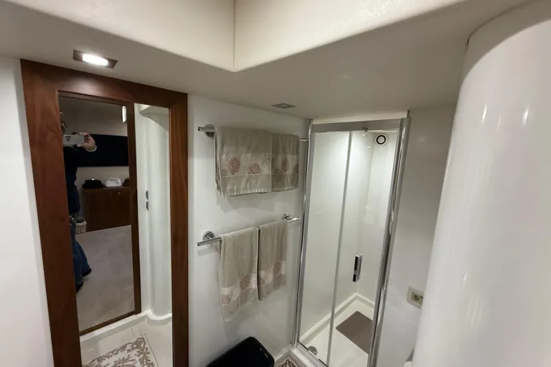 Thomas Yacht Photos Pics Luxurious bathroom in 2012 Sunseeker Manhattan 63 yacht with shower and elegant decor.