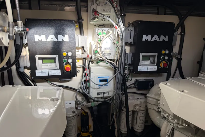 Thomas Yacht Photos Pics Engine room of 2012 Sunseeker Manhattan 63 yacht with MAN control panels.