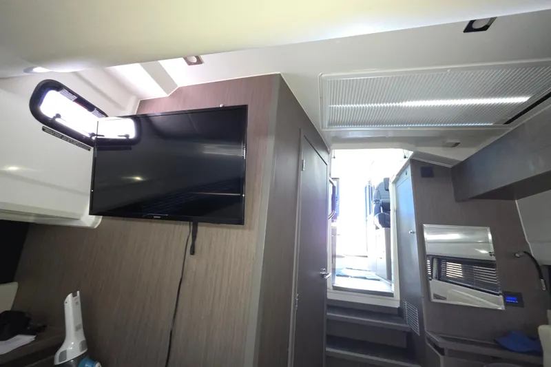  Yacht Photos Pics Interior of 2024 Wellcraft 355 Commuter boat with TV and modern design.