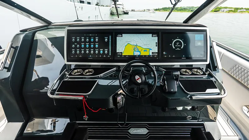  Yacht Photos Pics Cockpit of 2025 Cigarette 52 Thunder boat with advanced navigation displays and controls.