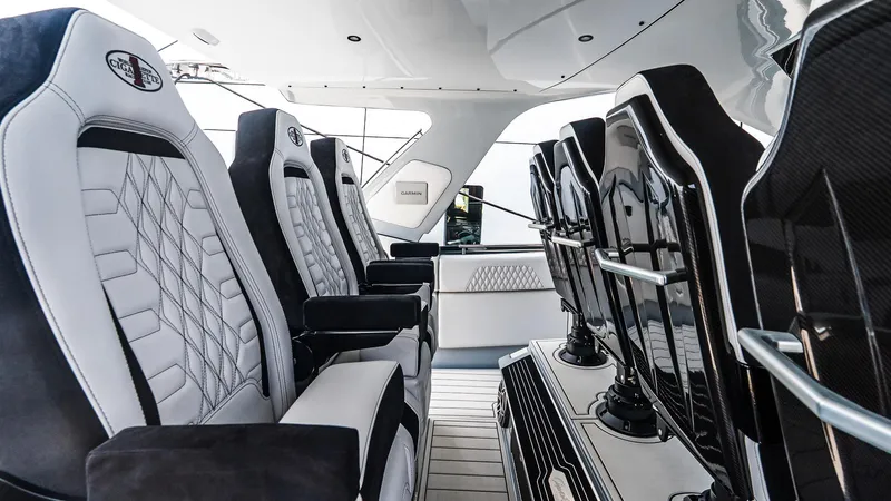  Yacht Photos Pics Luxurious interior seating of 2025 Cigarette 52 Thunder boat, featuring sleek, modern design.