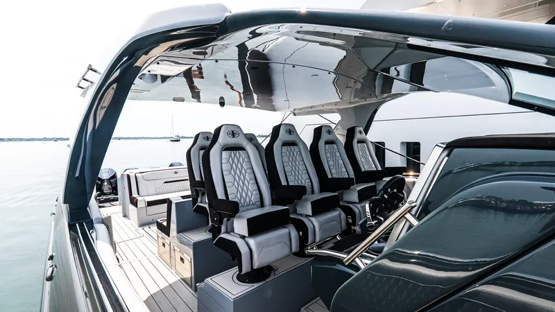  Yacht Photos Pics Luxurious interior of 2025 Cigarette 52 Thunder boat with sleek seating and modern design.