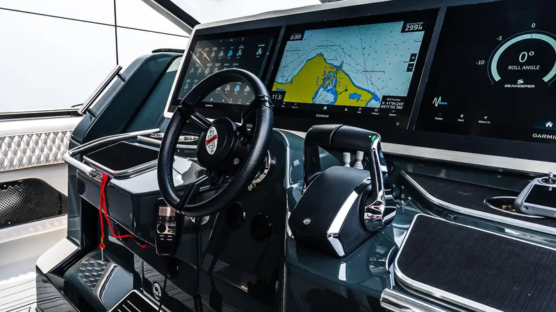  Yacht Photos Pics 2025 Cigarette 52 Thunder yacht cockpit with advanced navigation displays and controls.