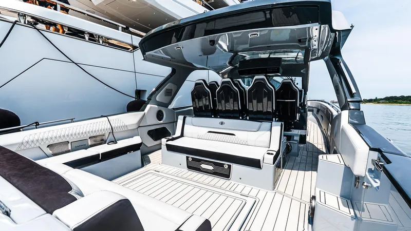  Yacht Photos Pics Luxurious 2025 Cigarette 52 Thunder yacht interior with sleek seating and modern design.