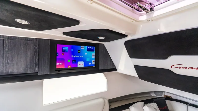  Yacht Photos Pics Interior of 2025 Cigarette 52 Thunder boat with modern entertainment system.