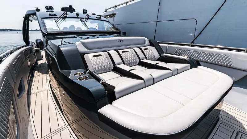  Yacht Photos Pics Luxurious seating on 2025 Cigarette 52 Thunder yacht, featuring sleek design and modern amenities.