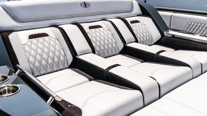  Yacht Photos Pics Luxurious interior seating of 2025 Cigarette 52 Thunder boat, featuring elegant diamond stitching.